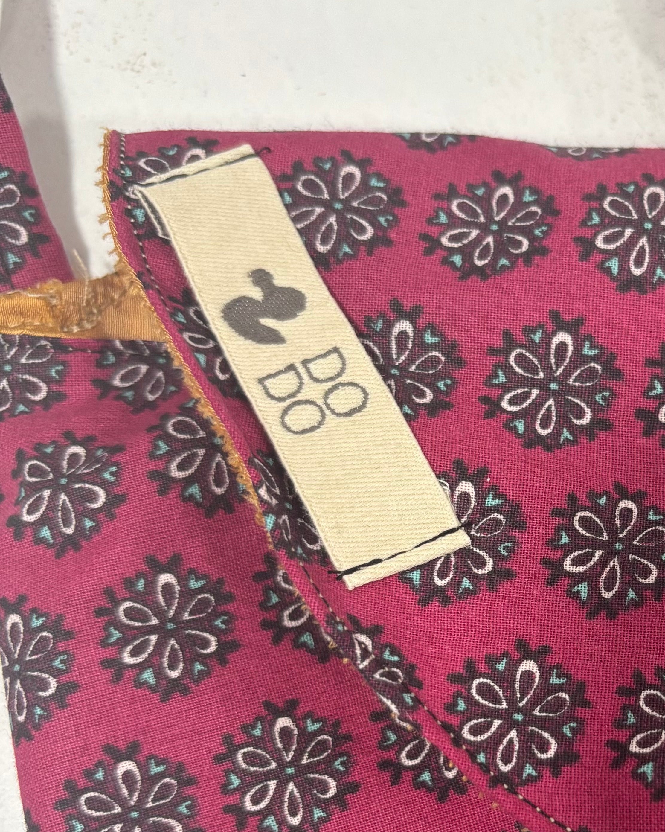 Bolso Bandolera Dodo: Flores Geométricas Granate